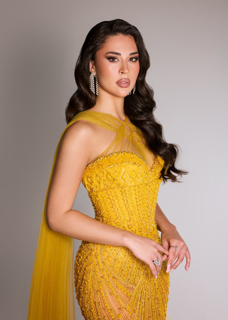 Model in a yellow gown wearing Jacobijoux diamonds